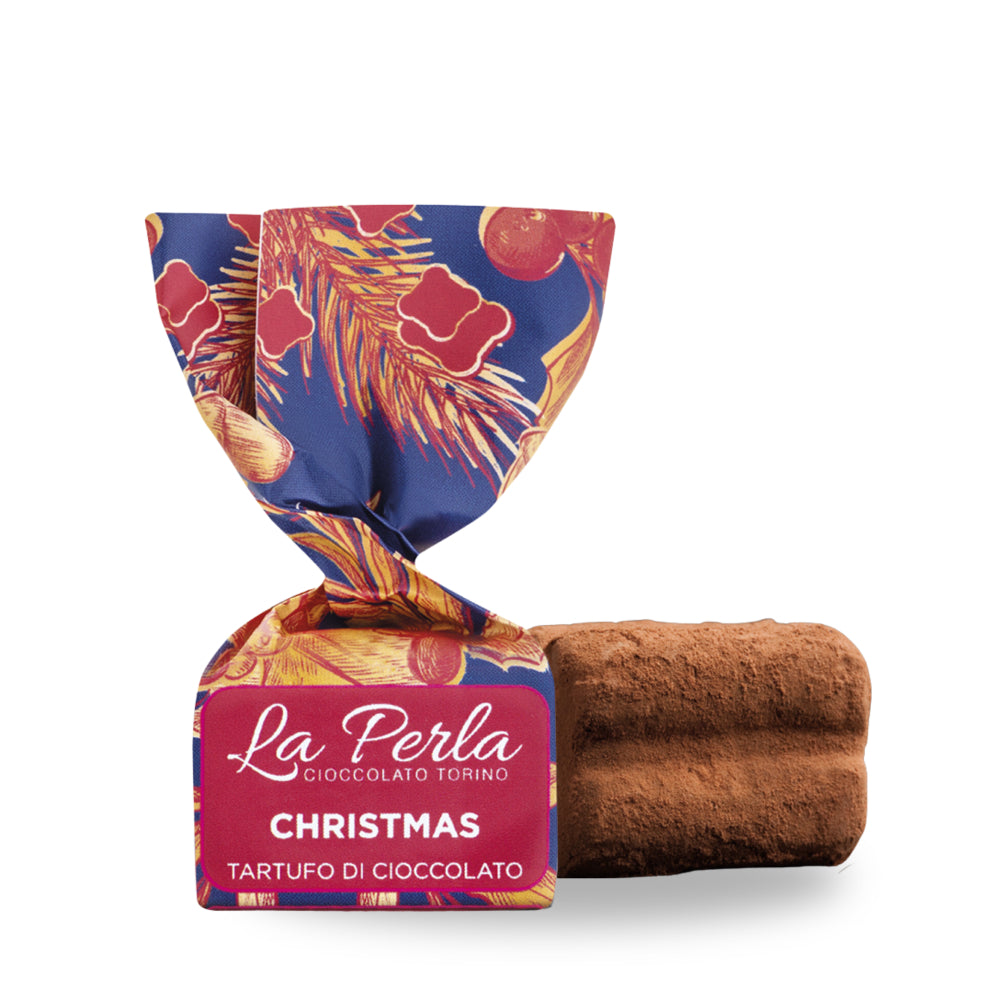 Scopri Tartufo Christmas La Perla Torino, cioccolato al latte con spezie e mandarino. Dolce eleganza natalizia da gustare o regalare.